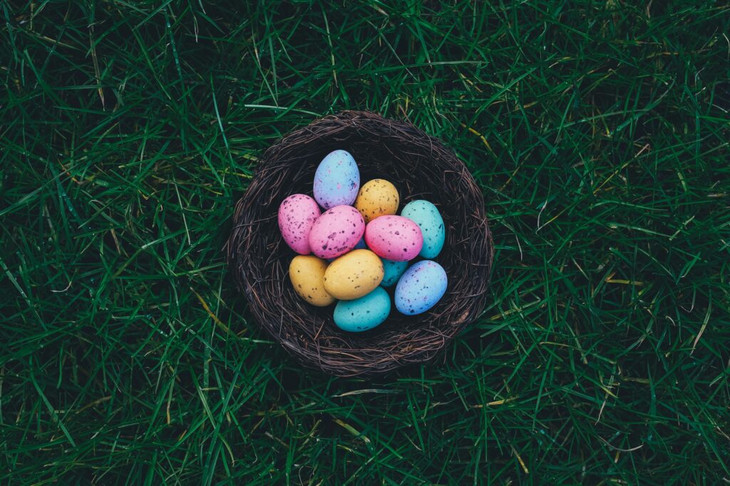 Colorful Easter eggs in a nest symbolizing Easter Sunday car accidents and holiday travel risks in New Jersey